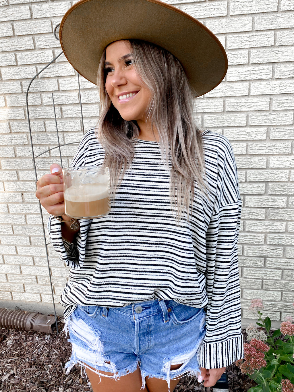 Womens black and ivory stripped knit jersey top with folded cuffed sleeves