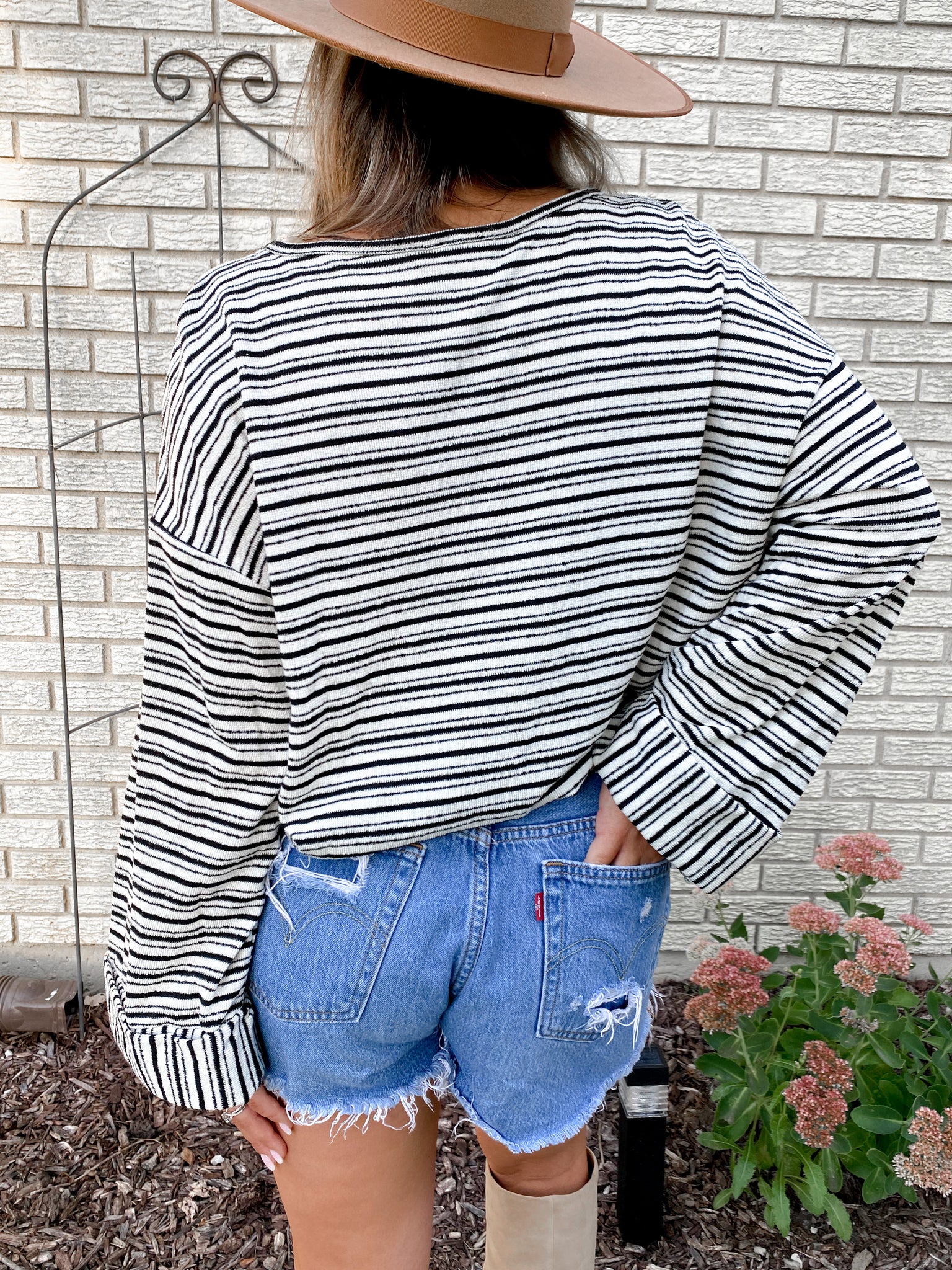 Womens black and ivory stripped knit jersey top with folded cuffed sleeves